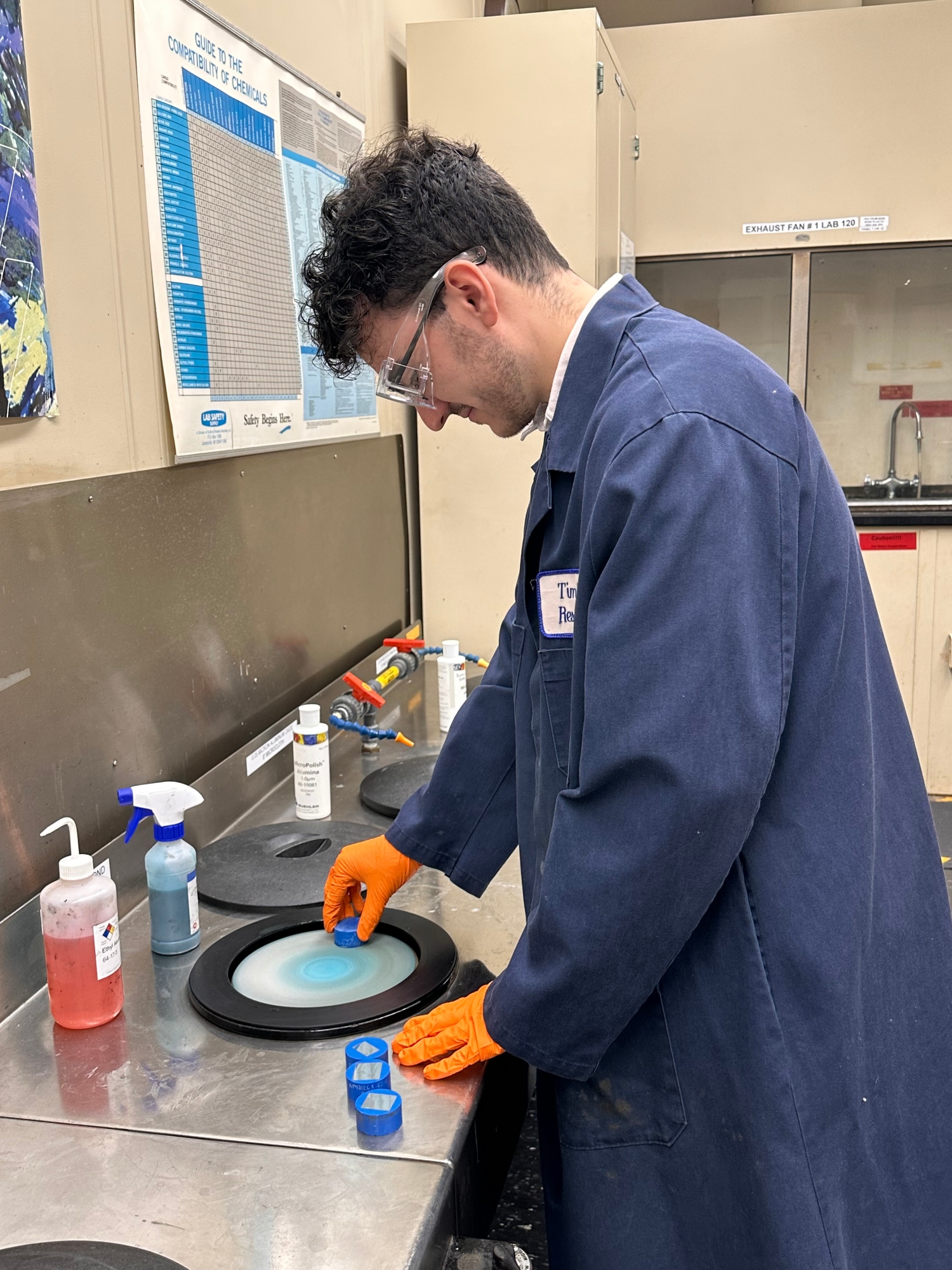 Andrew Zilavy in a lab using equipment