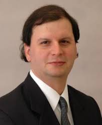 headshot of Alexis Kwasinski
