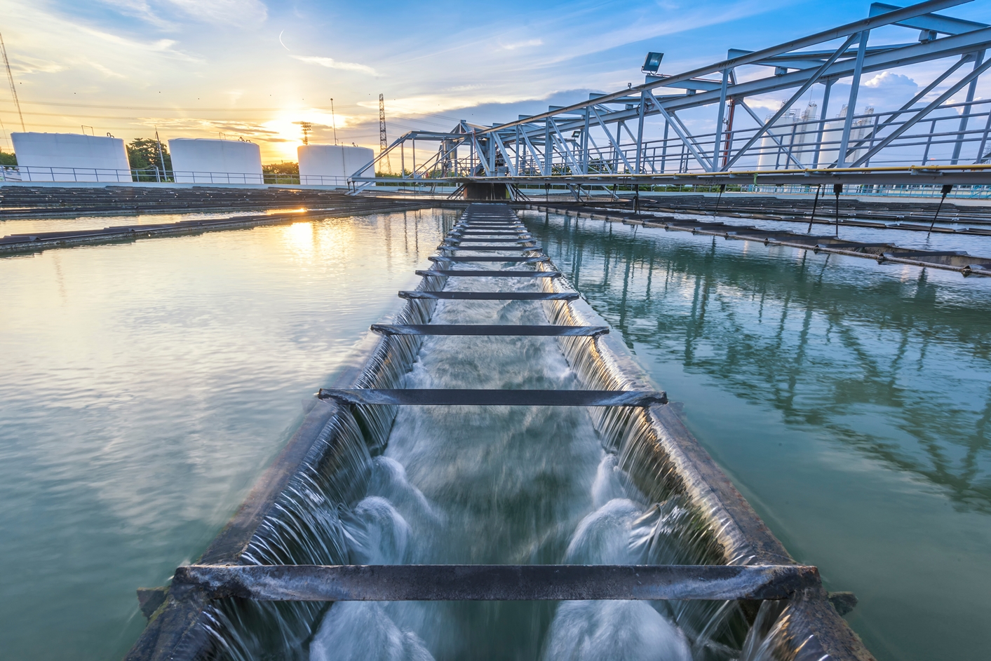 Water Treatment Plant at sunset (Adobe Stock)
