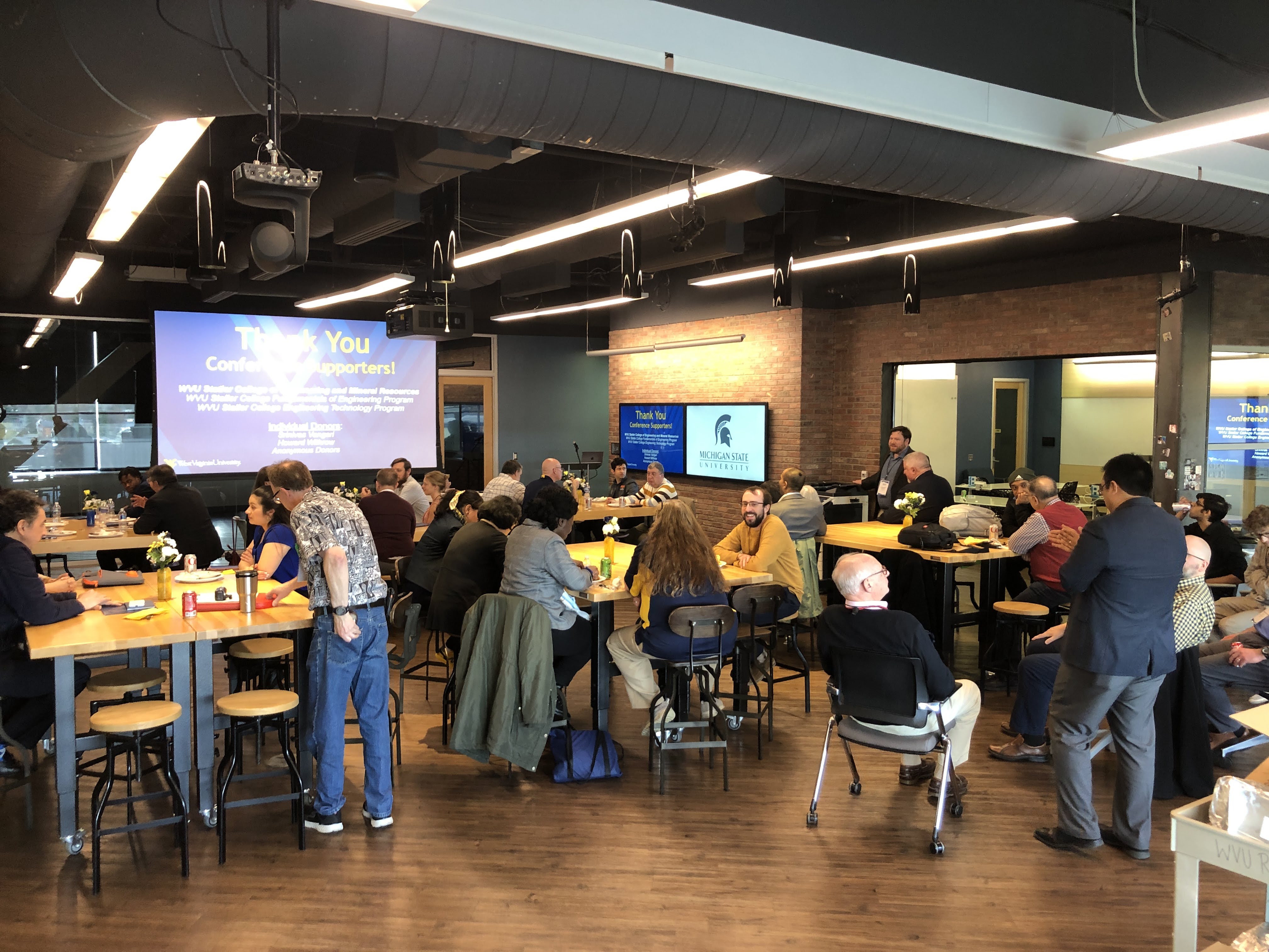 A group of people gather at the ASEE NCS 2023 Conference at West Virginia University