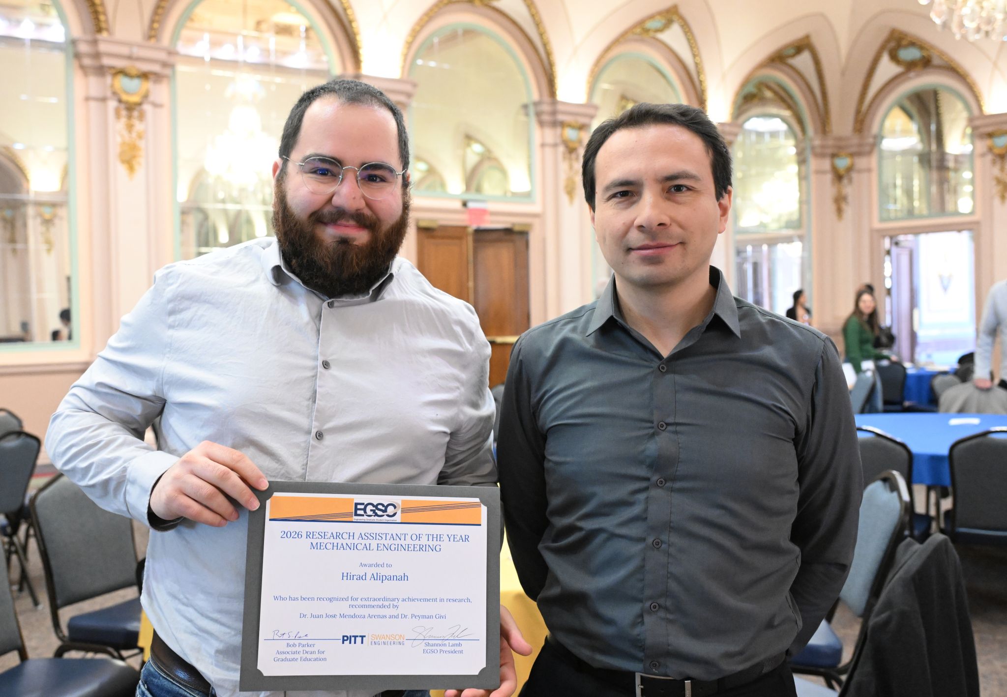 Hirad Alipanah receiving award