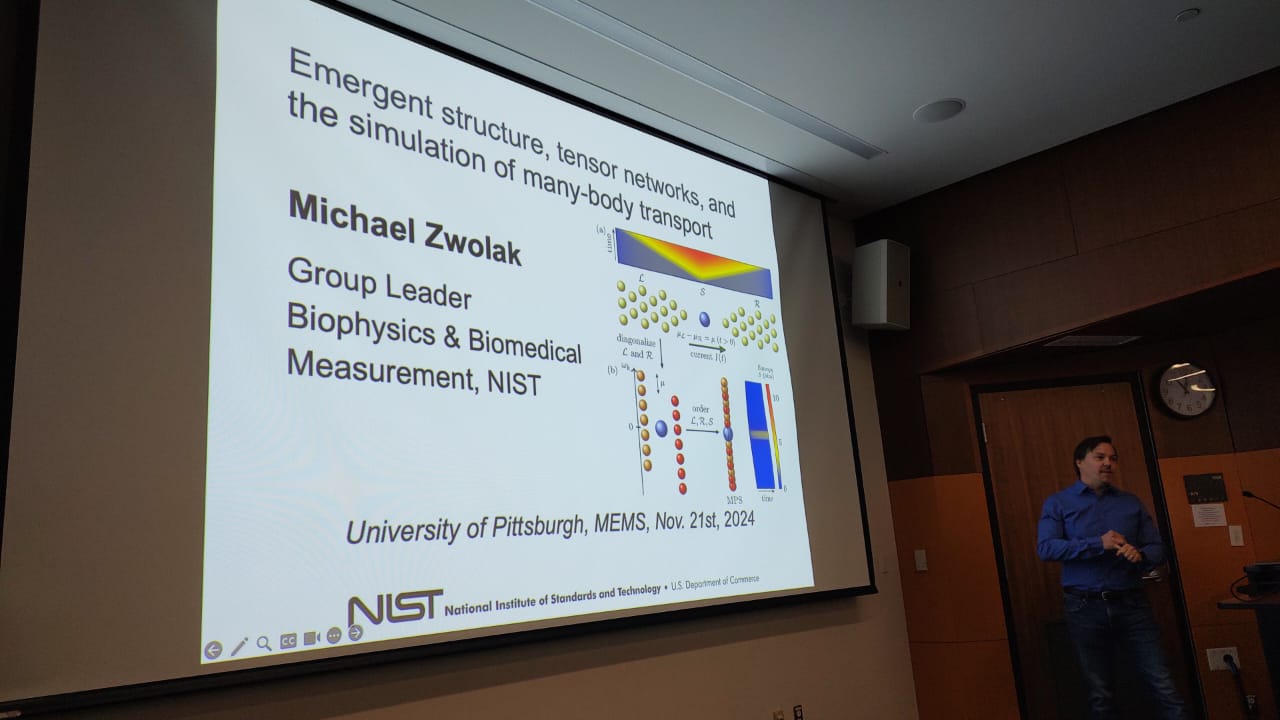 Dr. Michael Zwolak presenting a lecture in a classroom