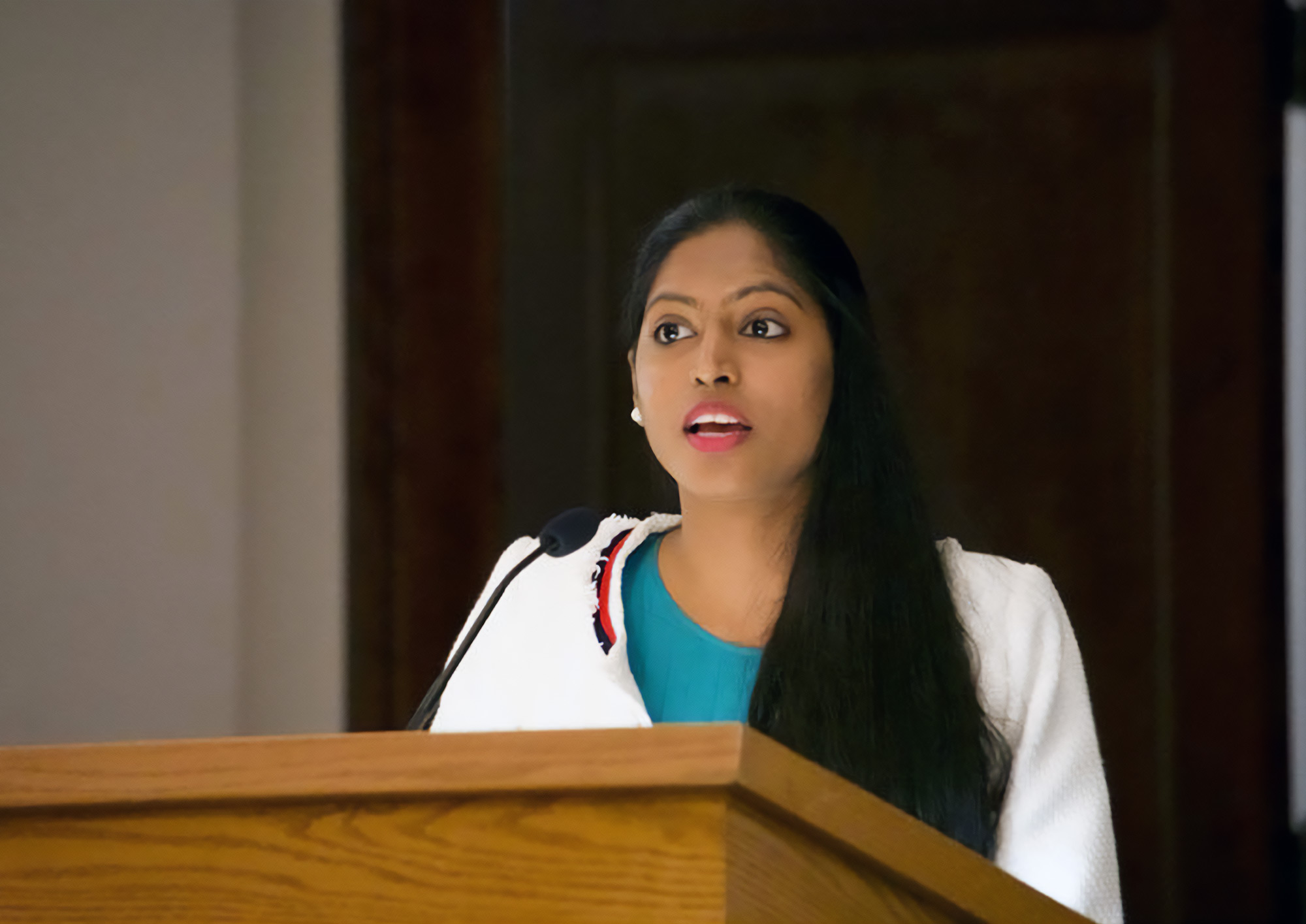 Divya lecturing