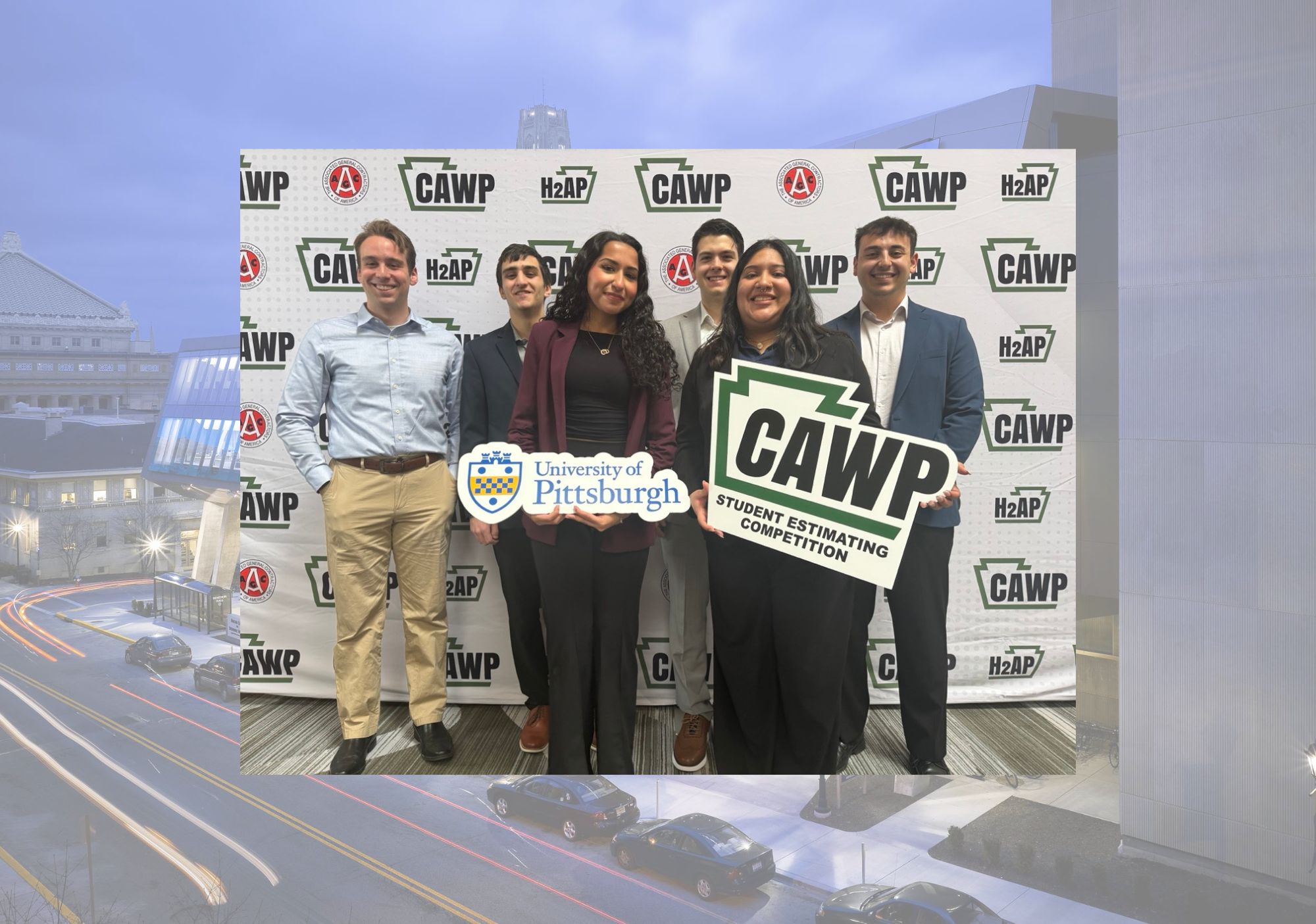 Benedum Builders team holding award check and CAWP sign
