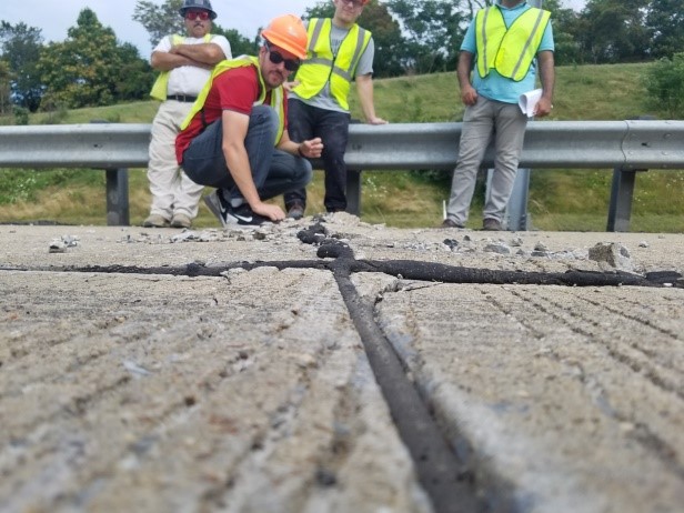 workers inspecting joint performance