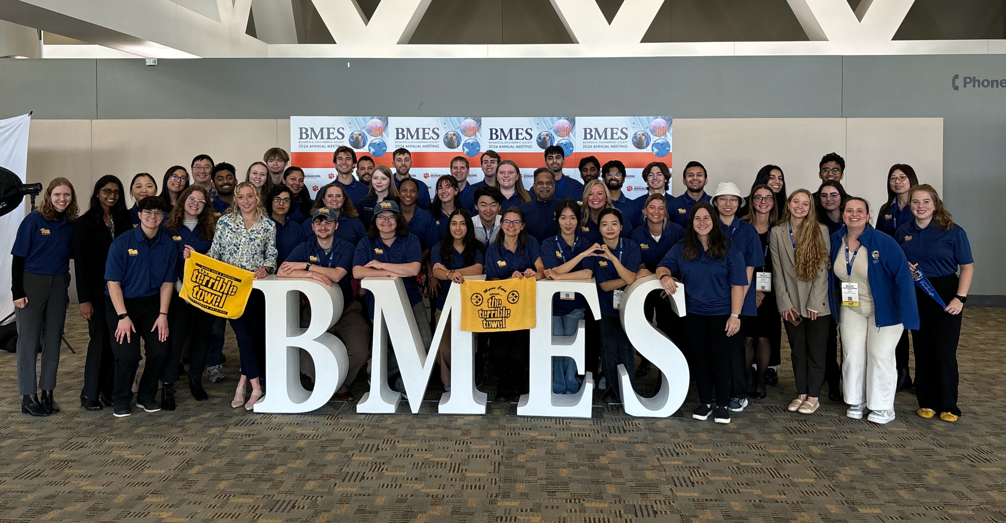 Students at a BMES conference