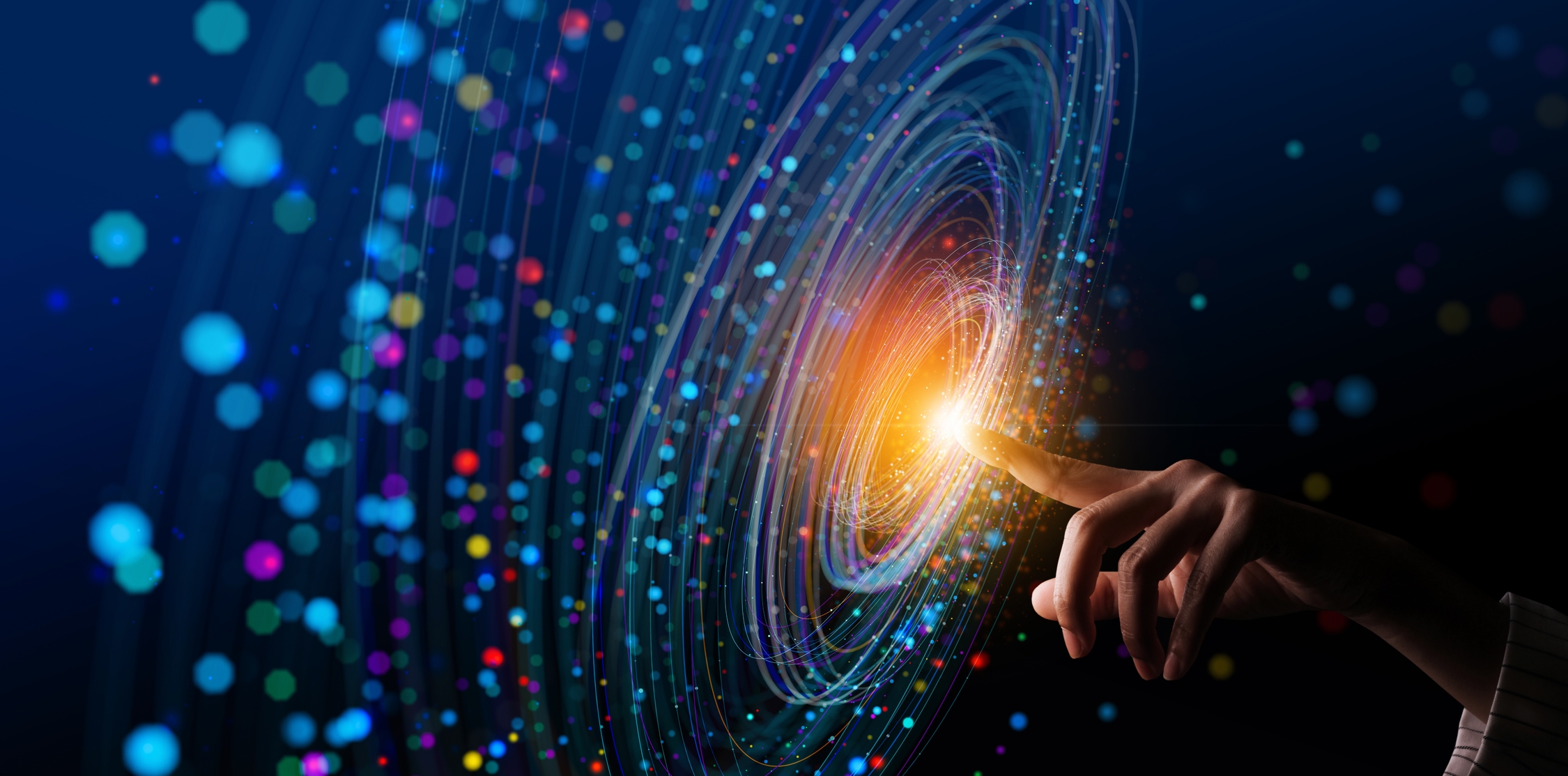 Stylized image of someone pointing at abstract light 
