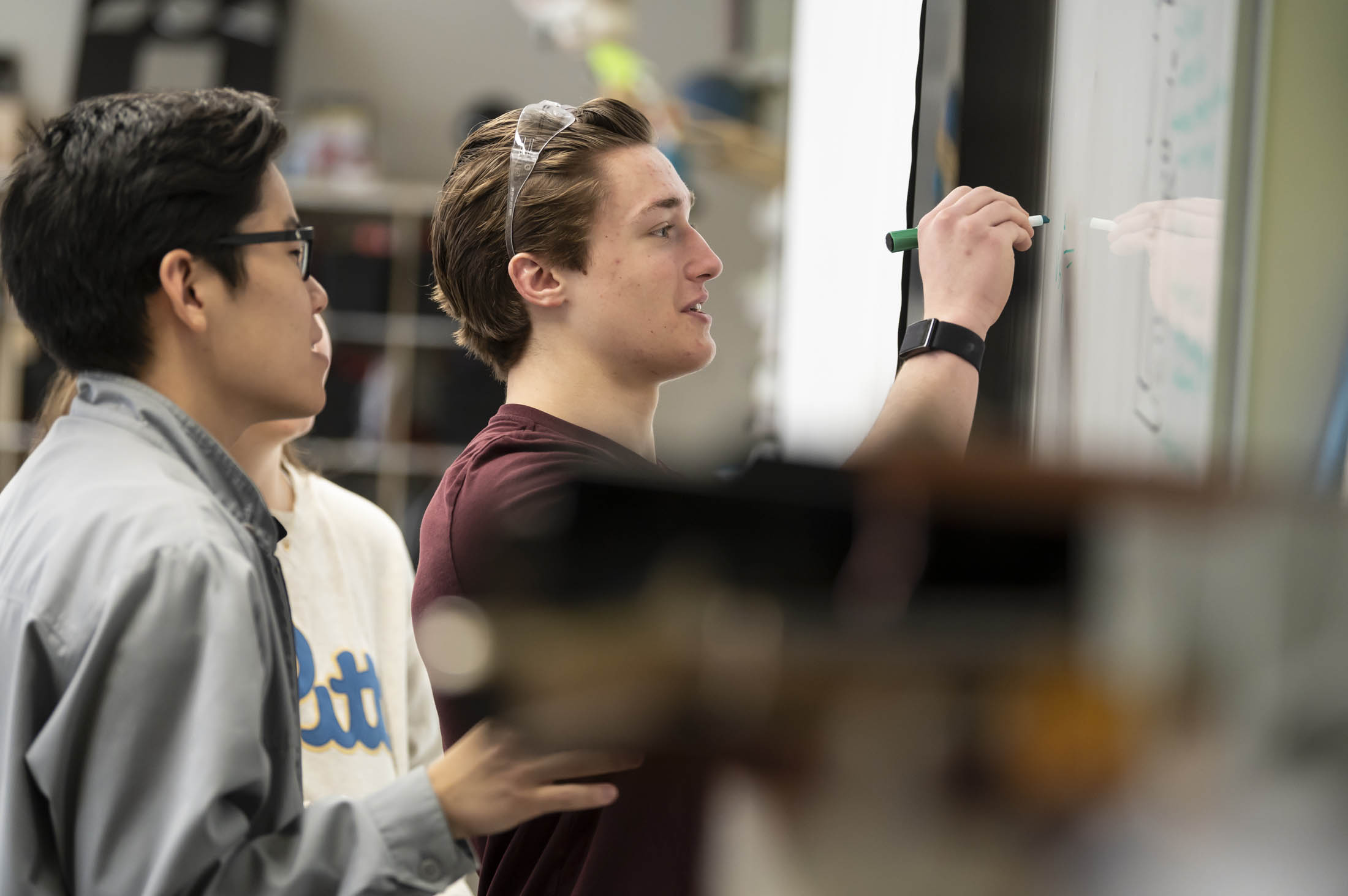 students at white board