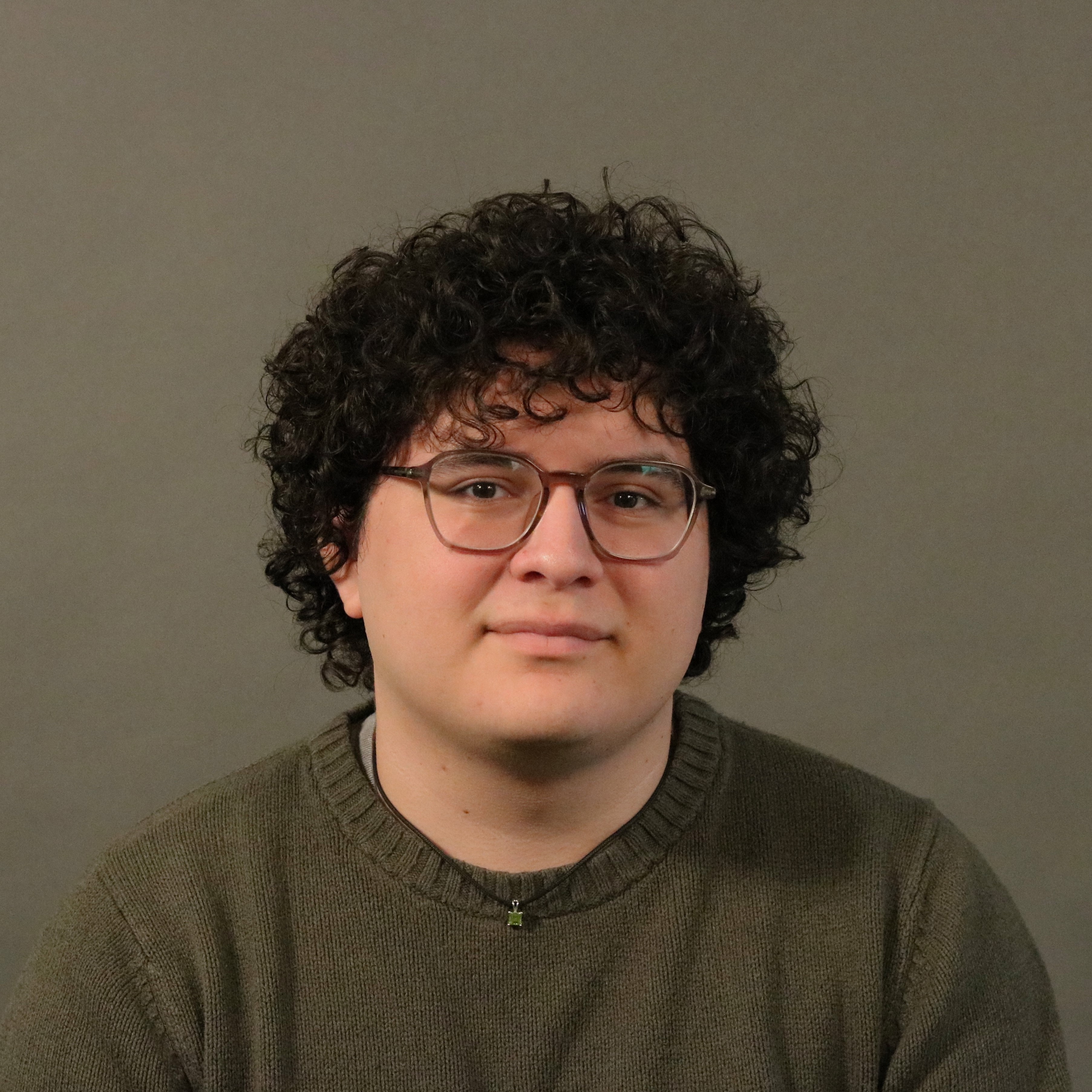 headshot of Miles Rosas