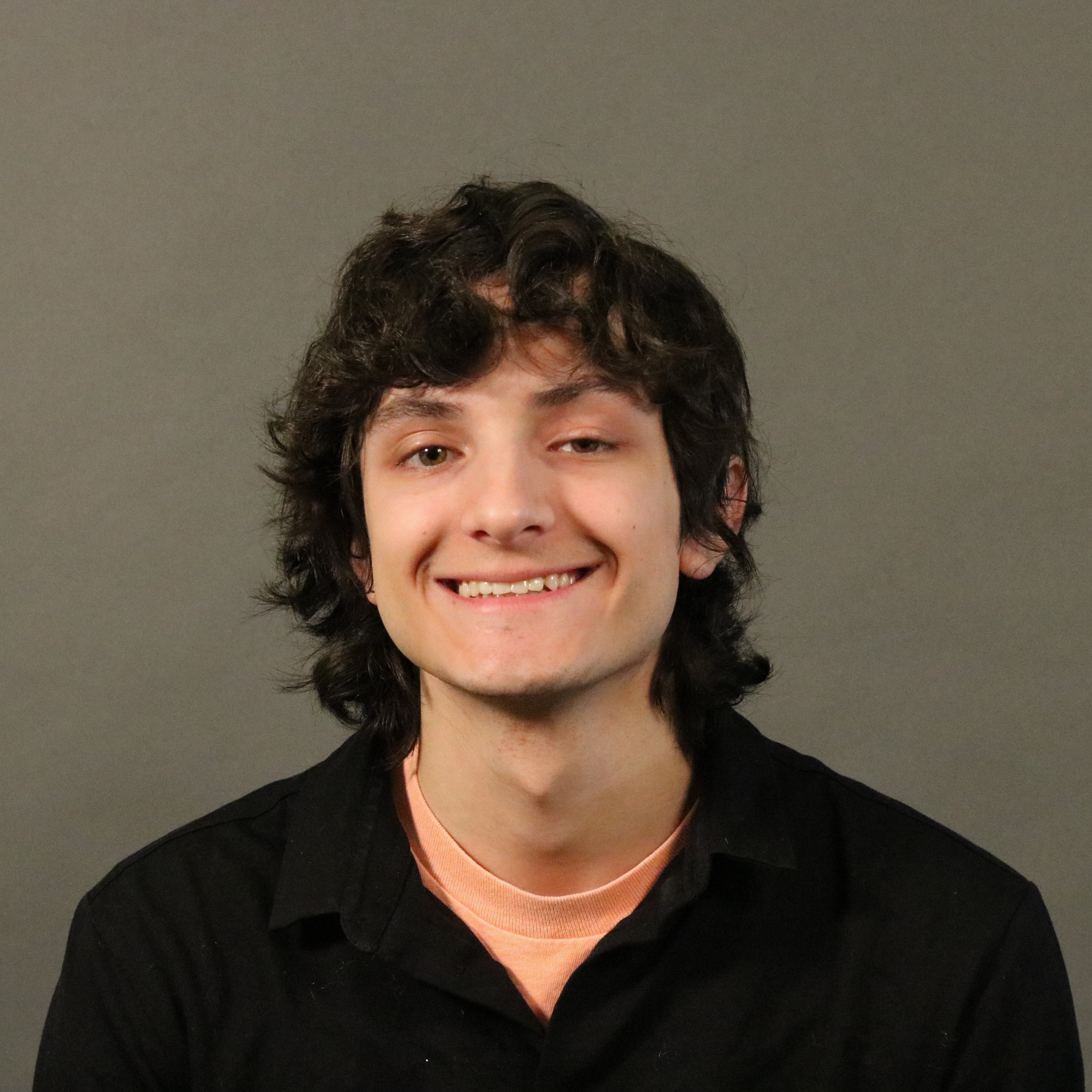 headshot of Sezer Benoit-Savci