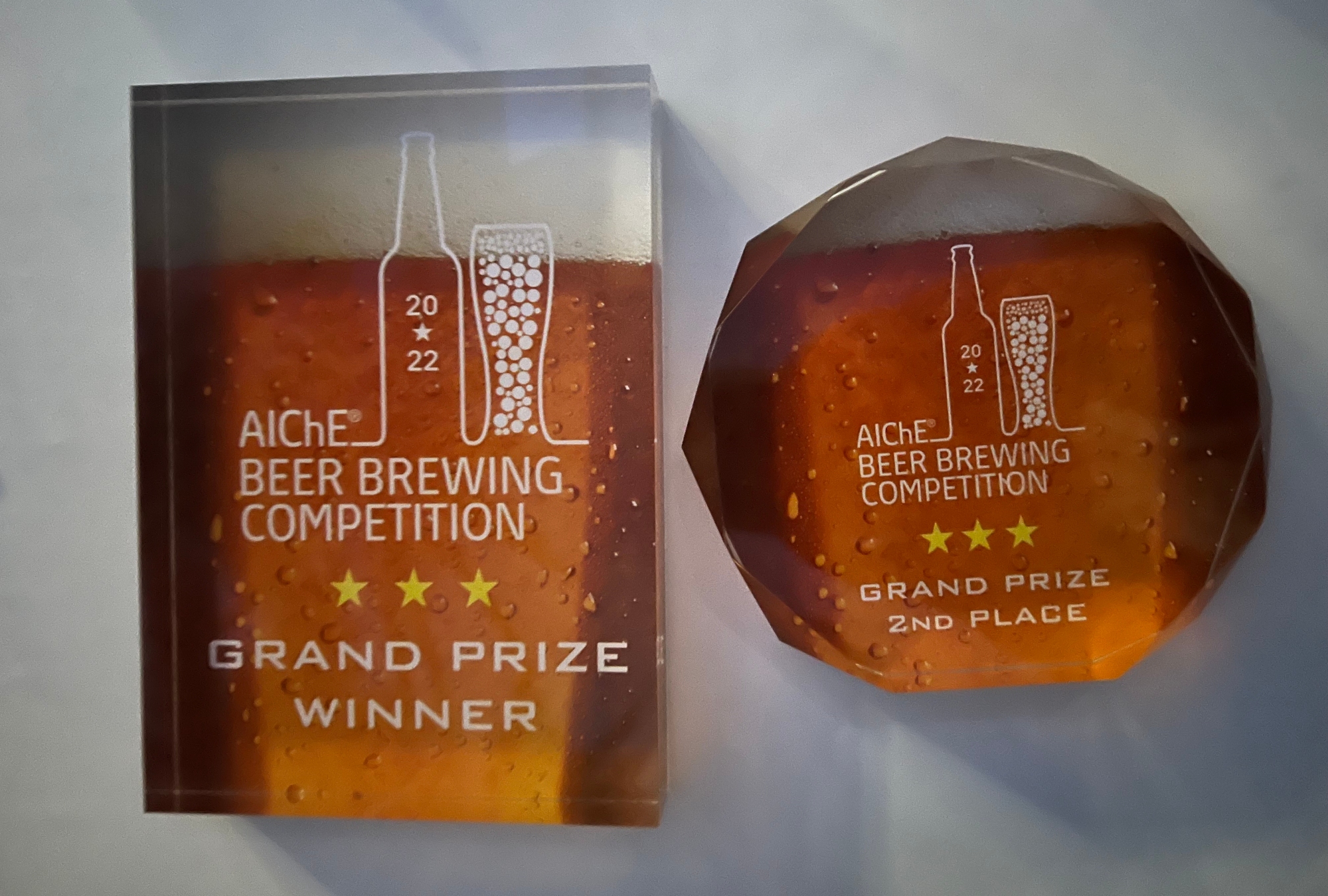 Two plaques from the 2022 AlChE Beer Brewing Competition Awards