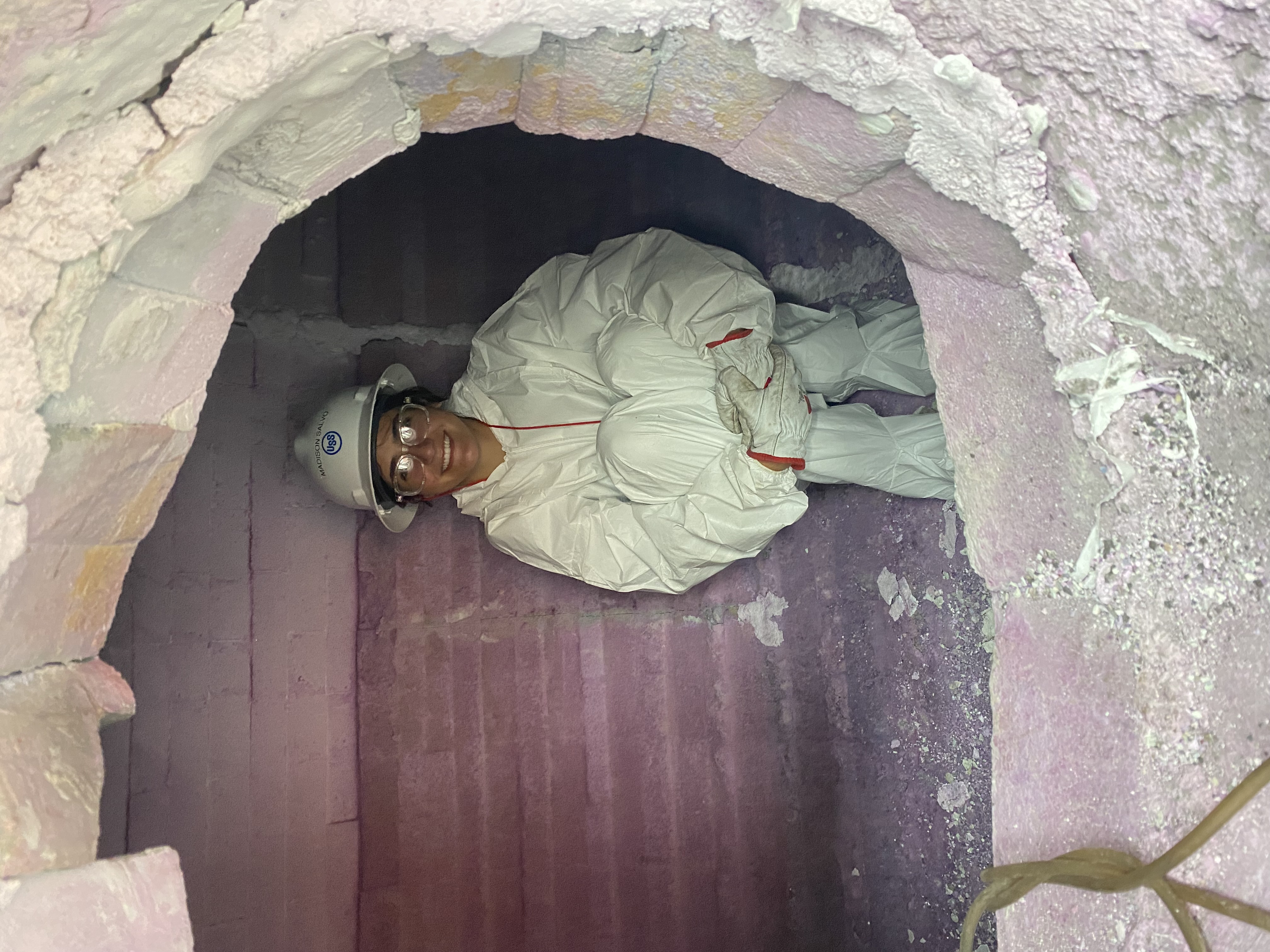 Madison Salvo on a job site in a hard hat