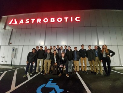 Group photo of students in front of the Astrobotic building