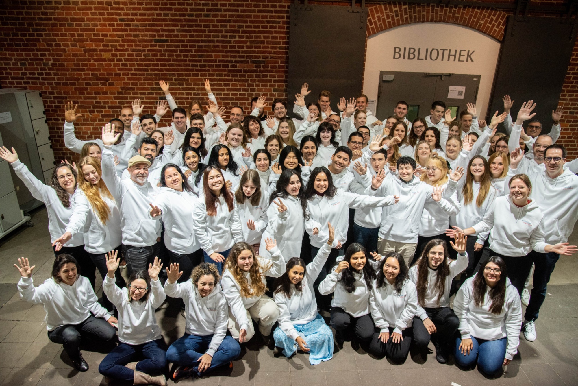 Big group shot of students at a past Moving the Cities conference