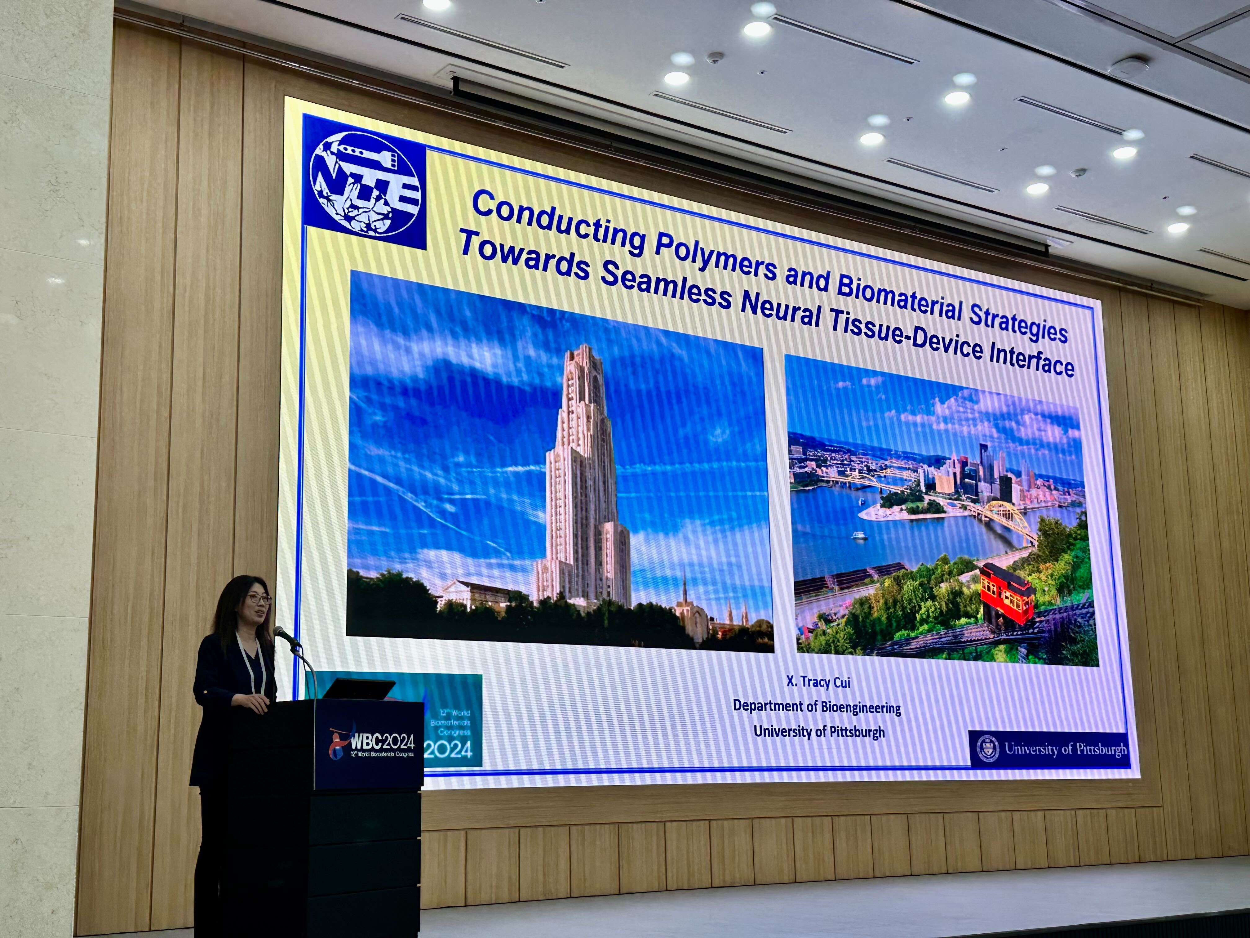  Dr. Cui giving her keynote presentation titled “Conducting Polymers and Biomaterial Strategies Towards Seamless Neural Tissue-Device Interfaces”   